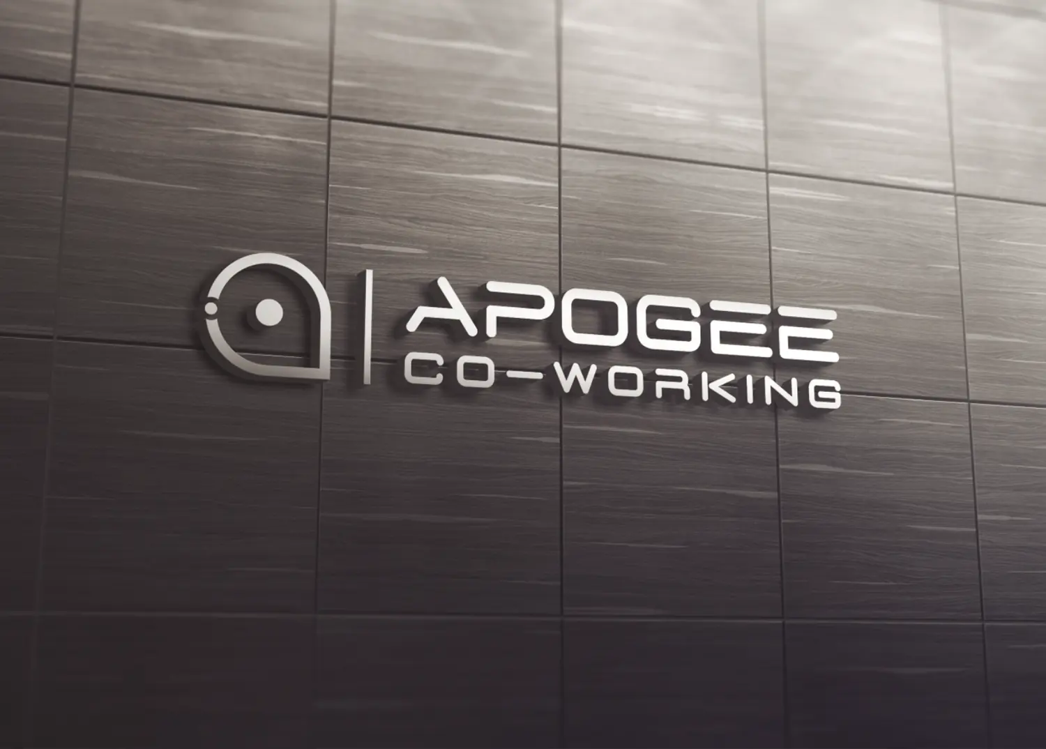 Das Apogee-Co-Working-Schild, montiert an einer Wand im Eingangsbereich